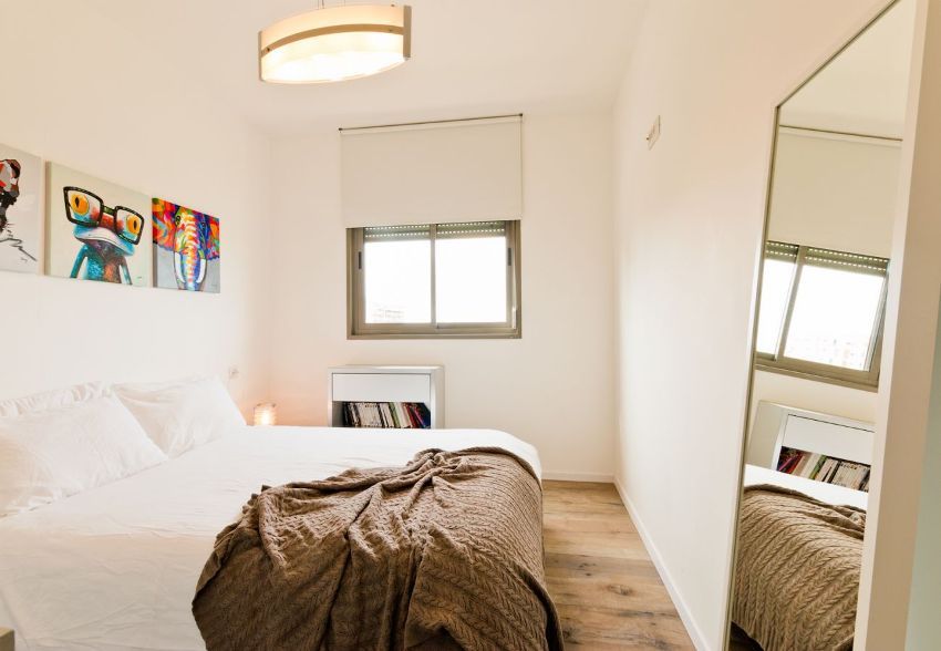 Lille soveværelse: design og indretning for at skabe et hyggeligt interiør