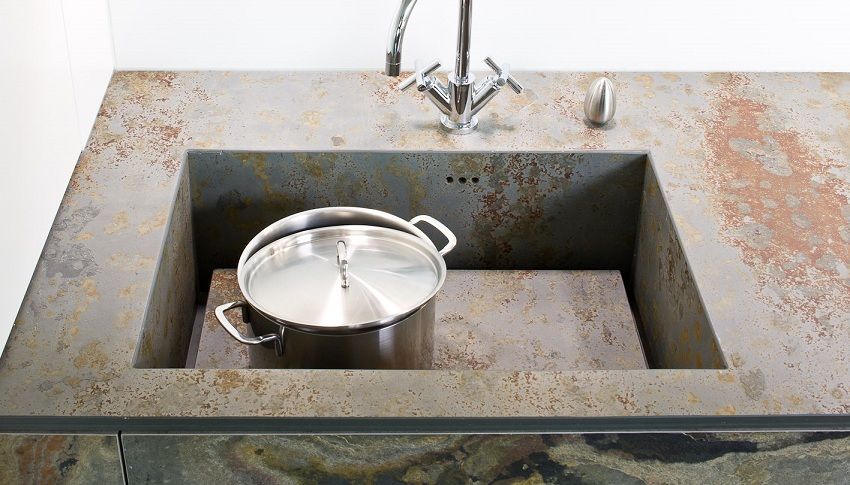 Vask til køkken fra en kunstig sten: egenskaber, valg af valg og afgang
