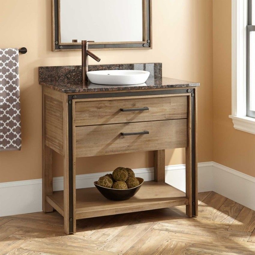 Sink med et skab på badeværelset: Et praktisk og funktionelt element i rummet