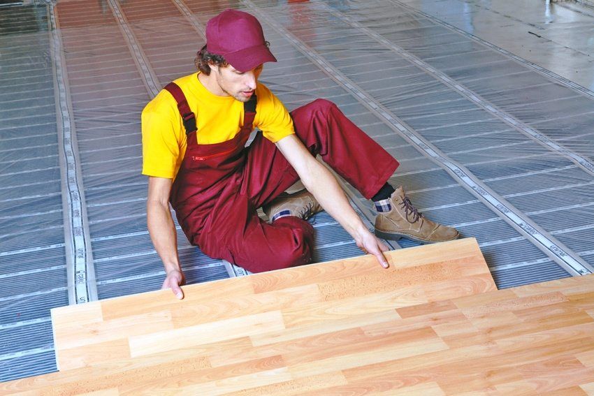 Varmt gulv under laminatet på trægulvet: typer og funktioner