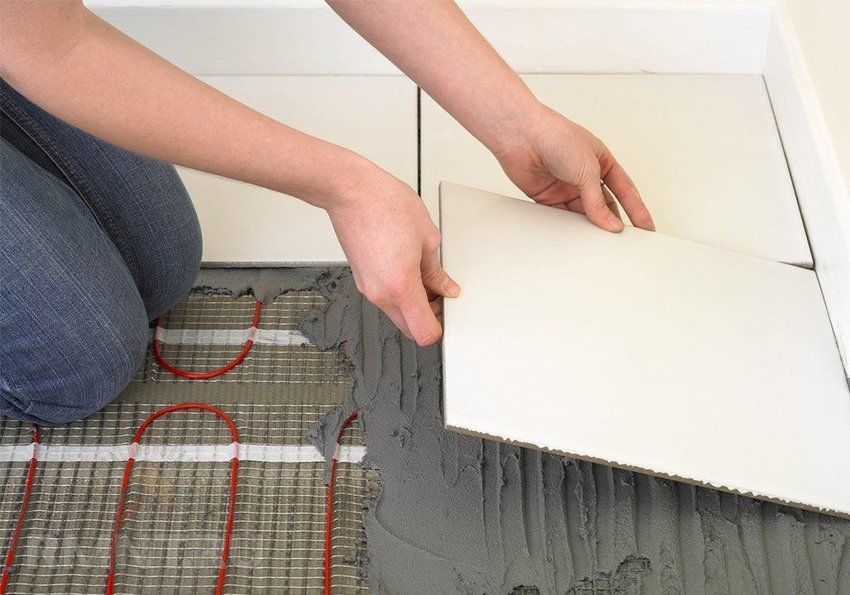Lægning af gulvvarme under fliser: teknologien til selvinstallationssystem